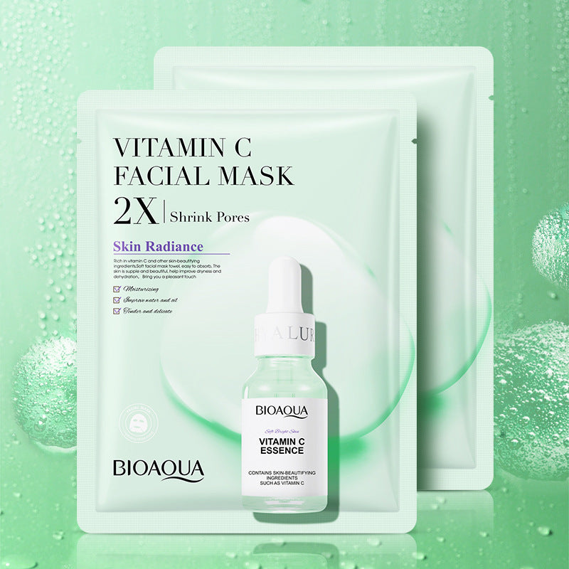 Vitamin C facial mask and serum with BIOAQUA branding on a green background